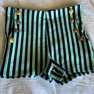 Striped turquoise shorts with gold accents